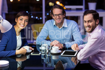 Businesspeople taking tea break