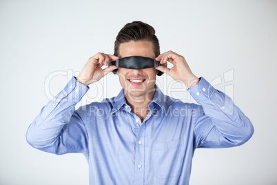 Man using virtual video glasses