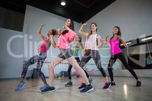 Group of women performing aerobics