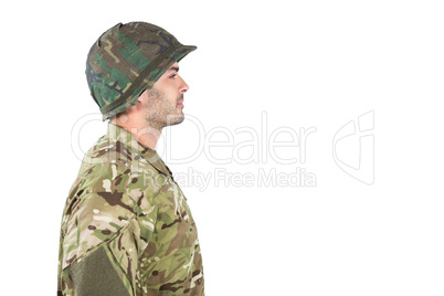 Side view of confident soldier standing