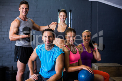 Male and female athletes in fitness studio