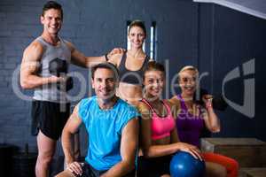 Male and female athletes in fitness studio