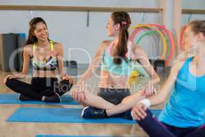 Group of women talking while exercising