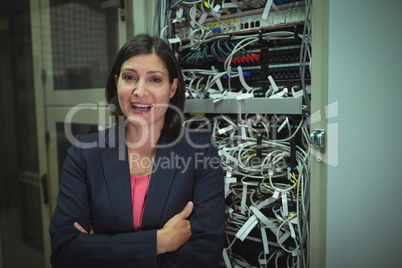 Portrait of technician standing with arms crossed