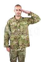 Portrait of confident soldier saluting