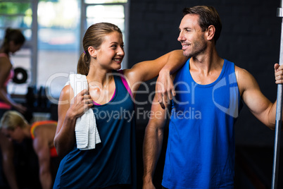 Smiling friends in gym