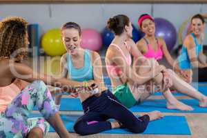 Group of women talking while exercising