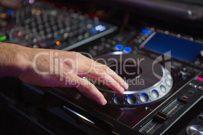 Male DJ playing music