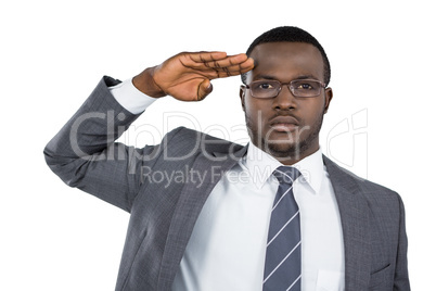 Close-up of businessman saluting
