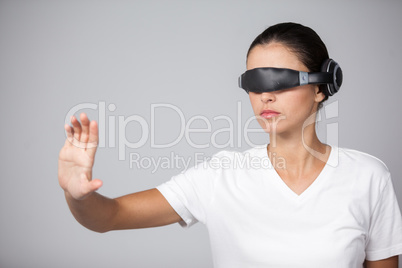 Woman using virtual video glasses