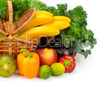 vegetables and fruits in a basket isolated on white background