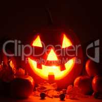 scary pumpkin head with glowing eyes - a symbol of Halloween