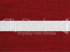 Fahne von Lettland auf altem Leinen