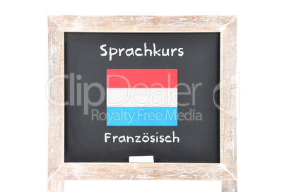 Sprachkurs mit Flagge auf Tafel