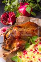 Duck with millet and pomegranate