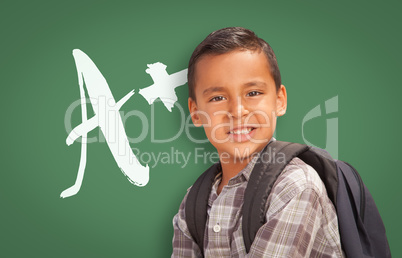 Hispanic Boy Up in Front of A+ Written on Chalk Board
