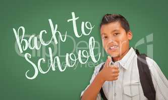 Thumbs Up Hispanic Boy in Front of Back To School Chalk Board
