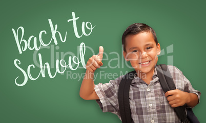 Thumbs Up Hispanic Boy in Front of Back To School Chalk Board