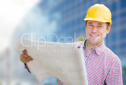 Male Contractor with Hard Hat In Front of Building