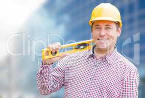 Male Contractor with Hard Hat In Front of Building
