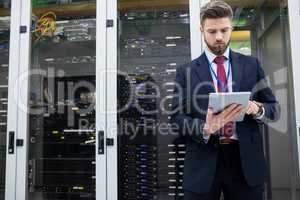 Technician using digital tablet