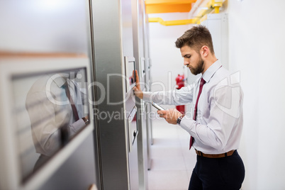 Technician using mobile phone