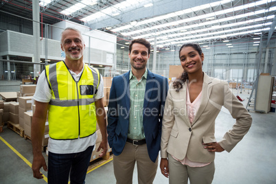 Portrait of warehouse team standing together