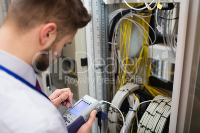 Technician using digital cable analyzer