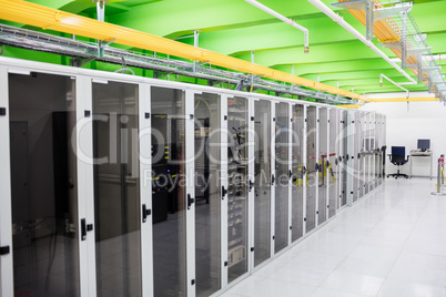 Hallway with a row of servers