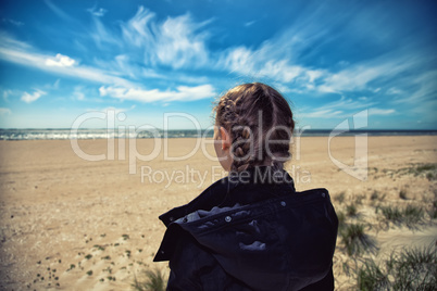 girl looking at the sea