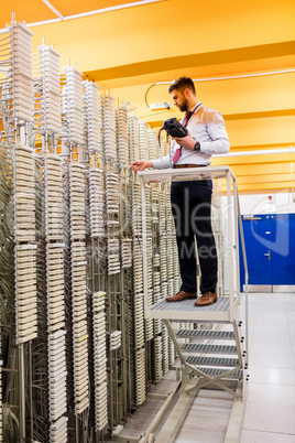 Technician using digital cable analyzer