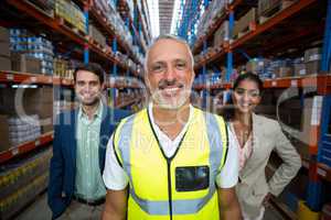 Portrait of warehouse team standing together