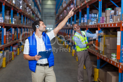 Warehouse workers interacting with each other