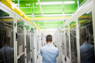 Technician standing in hallway