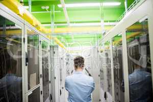 Technician standing in hallway