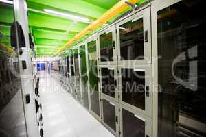 Hallway with a row of servers