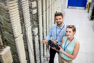 Technicians using digital cable analyzer