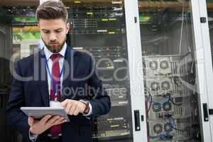 Technician using digital tablet