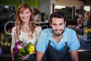 Portrait of couple standing and smiling