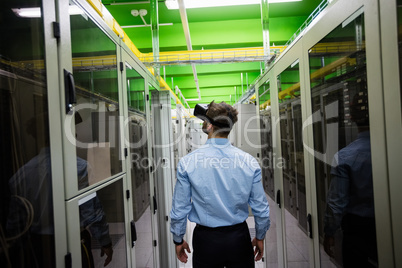 Technician using virtual reality headset