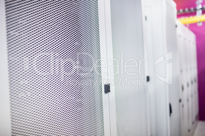 Hallway with a row of servers