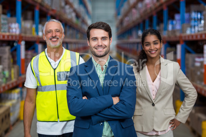 Portrait of warehouse team standing together