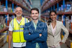 Portrait of warehouse team standing together