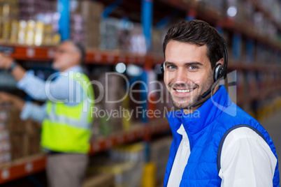 Warehouse worker in headset