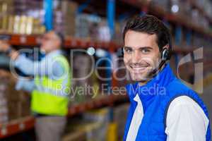 Warehouse worker in headset