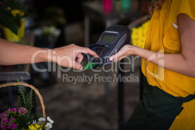 Man making payment with his credit card