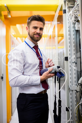 Technician using digital cable analyzer