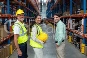 Portrait of warehouse team standing together