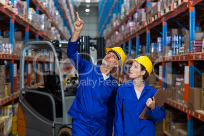 Warehouse workers checking the inventory
