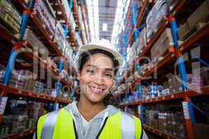 Happy female warehouse worker